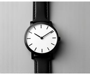 Ultra-thin minimalist watch with dark leather strap